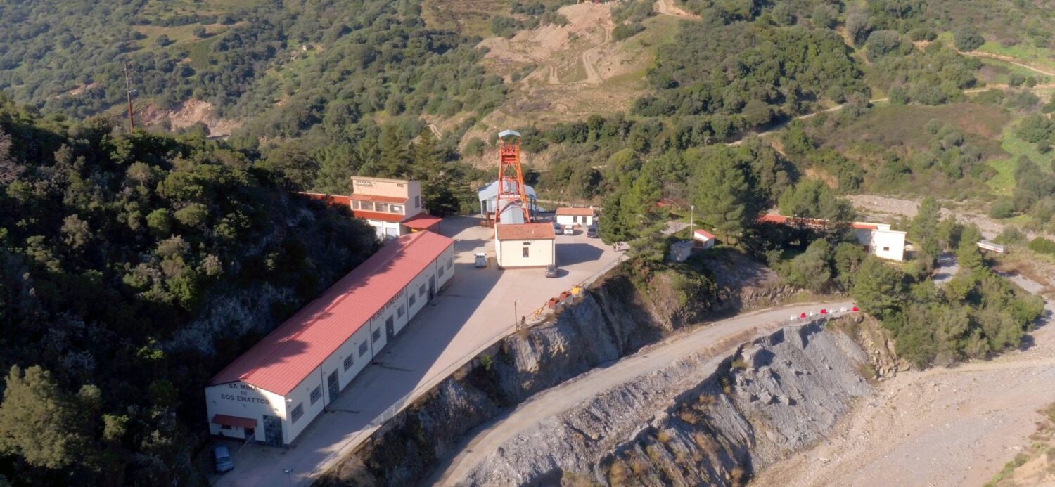 An image shows the buildings of the old mine in Sos Enattos, Italy.