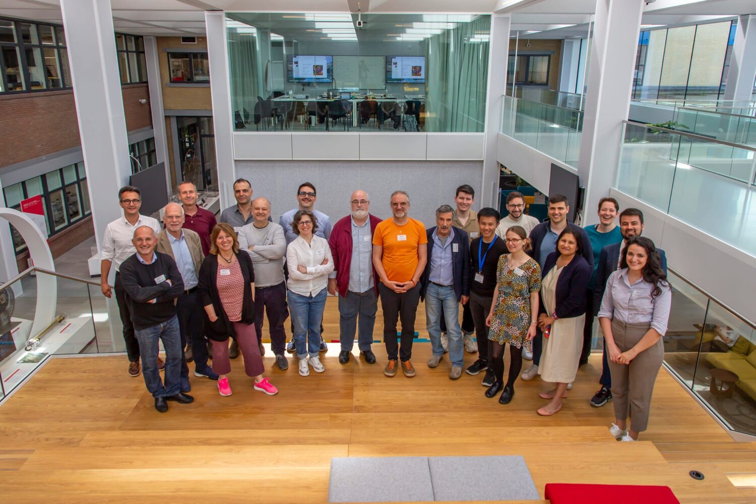An image of people gathered and posing for a group photo during the ETO General Meeting.