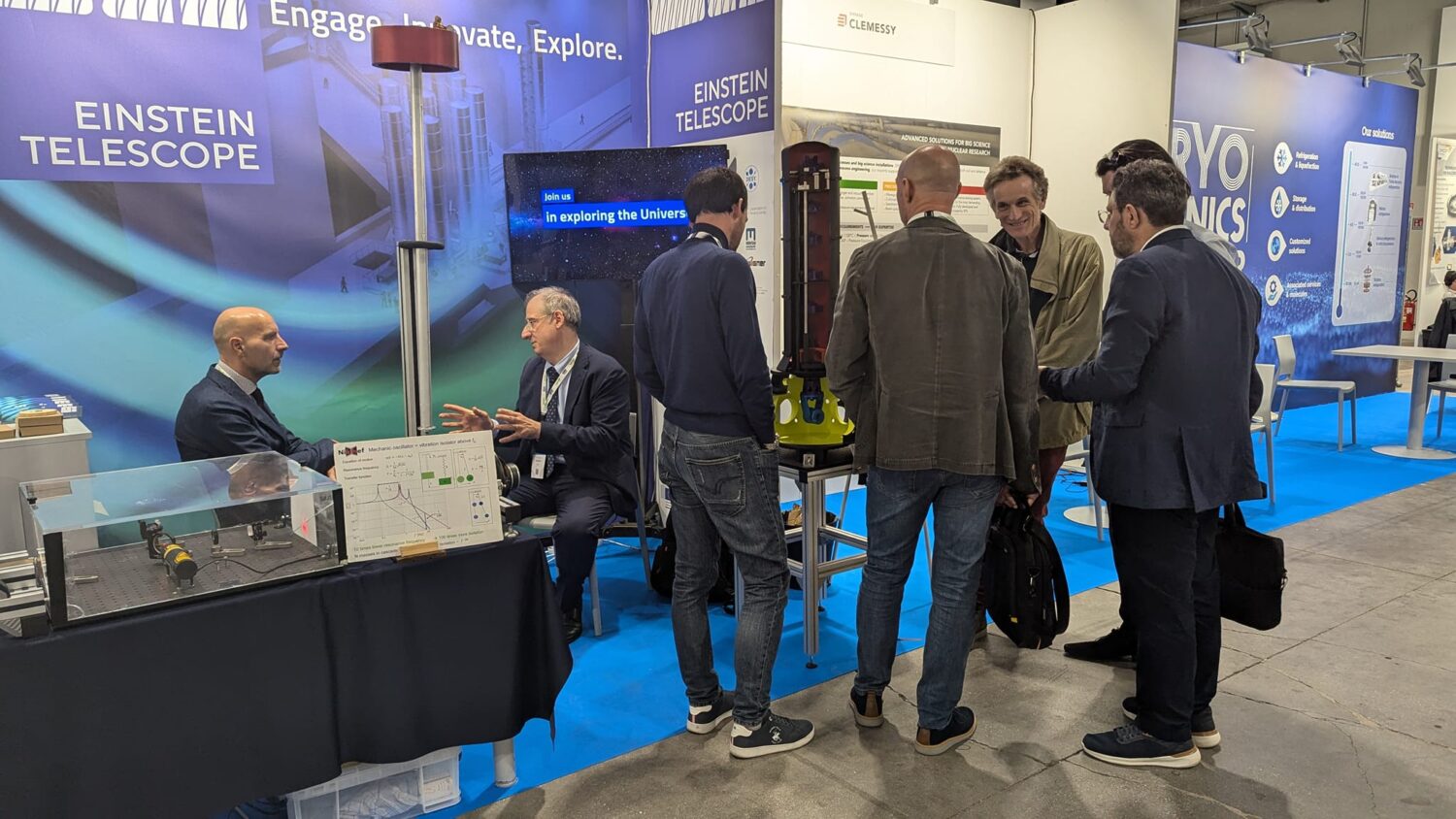The photo shows a group of people experiencing the BSBF meeting in Trieste 2024 and chatting.