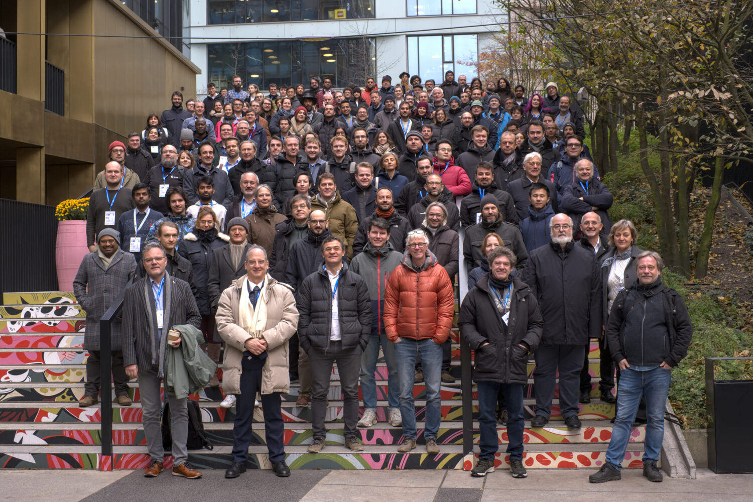 An image of people gathered and posing for a group photo during the ET annual meeting in Warsaw 2024.