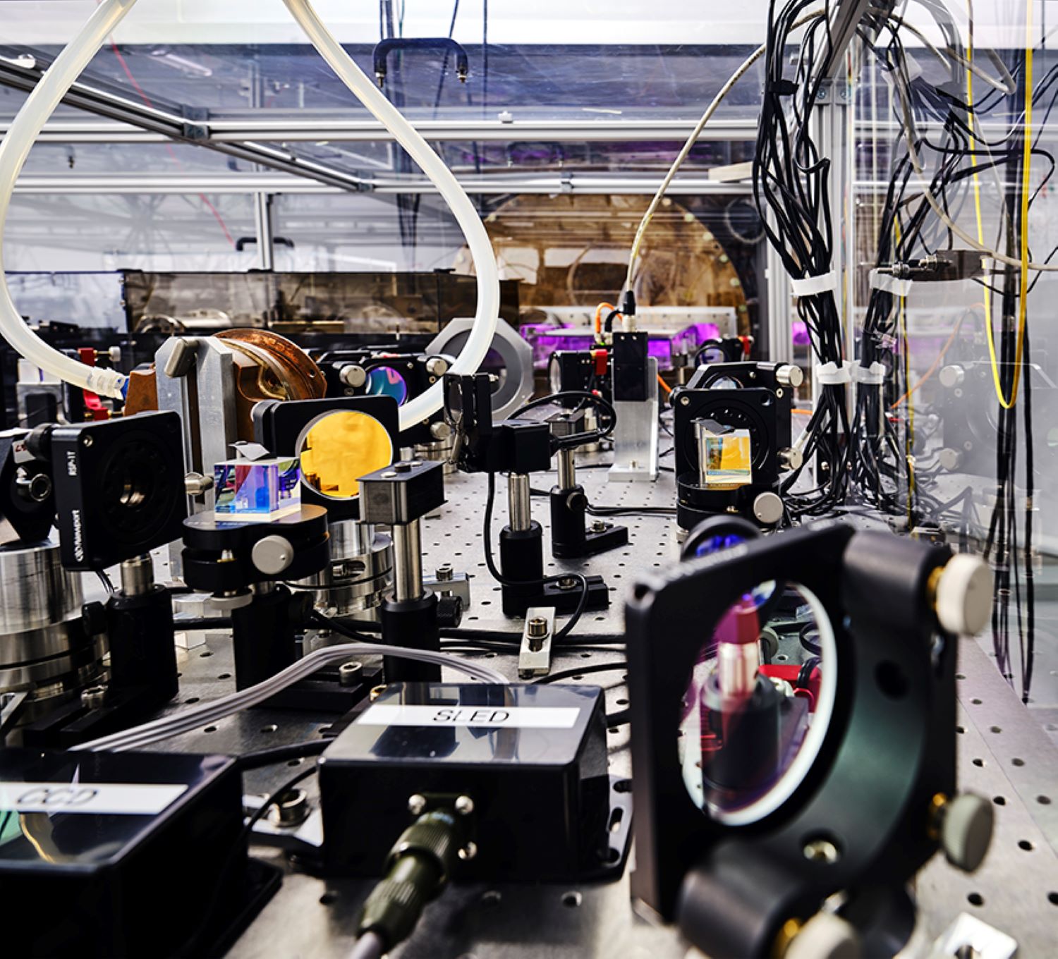 An image shows one of the optical benches of the Virgo gravitational wave detector.