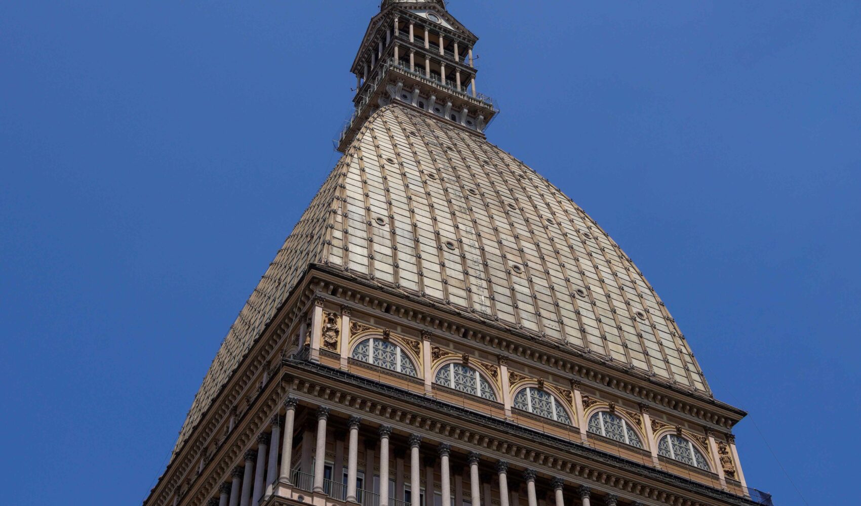An image shows the roof of a building in Turin, Italy.